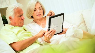 Senior Couple at Home with a Wireless Tablet