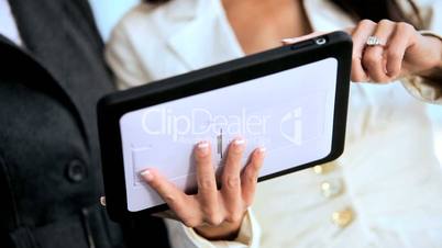 Smart Businesswomen with Wireless Tablet