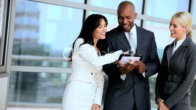 Smart Business Executives Using Wireless Tablet Outdoors