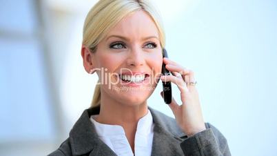 Female Business Executive with Smartphone in Close up