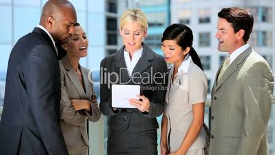 Multi Ethnic Business Team With Wireless Technology