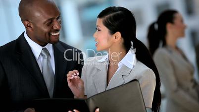 Multi Ethnic Business Team Meeting in Modern Building