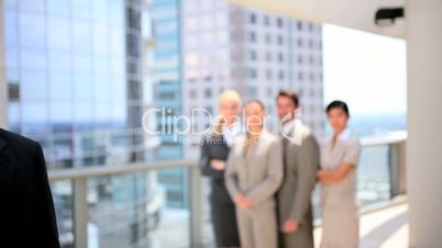African American Businessman in Portrait with Colleagues