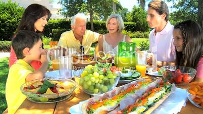 Family Generations Sharing Healthy Lunch
