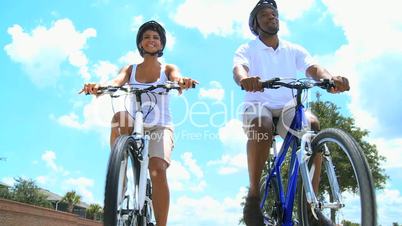 African American Couple Cycling Exercise