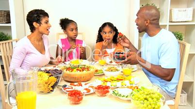 Young Ethnic Family Eating Healthy Lunch Together