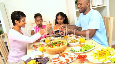 African American Family Enjoying a Healthy Lunch
