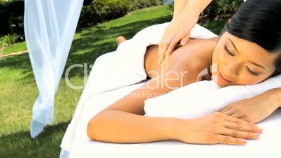 Beautiful Asian Girl Relaxing with Massage