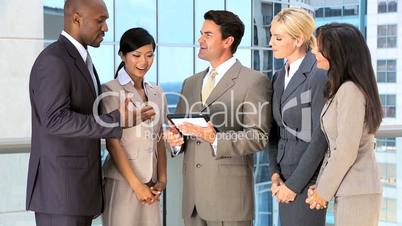 Young Multi Ethnic Business Team in Modern Office Building