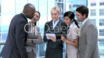 Ambitious Business Executives Using Wireless Tablet