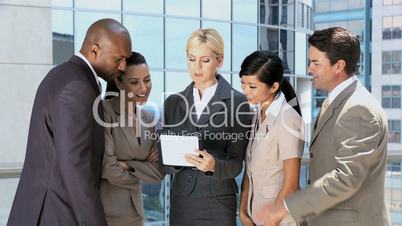 Ambitious Business Executives Using Wireless Tablet