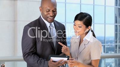 Young Multi Ethnic Business People with Wireless Tablet