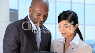 Young Multi Ethnic Business People with Wireless Tablet