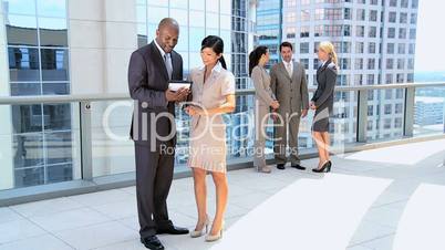 Multi Ethnic Business Team Working in Modern Building