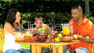 African American Family Healthy Eating Outdoors