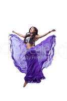 Beautiful girl  jump in dance with flying fabric