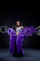 girl dance in dark - oriental flying purple cloth