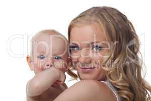 Beauty blond mother with baby look on camera