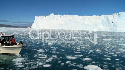 Nautical Vessel Passing a Glacier