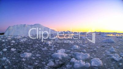 Arctic Sunset over Frozen Landscape