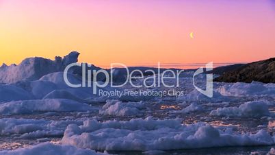 Arctic Sunset over Frozen Landscape