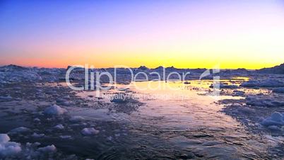 Golden Sunset over Frozen Arctic Landscape