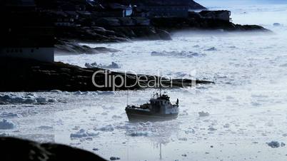 Boat in Freezing Mist Surrounded by Ice Floes