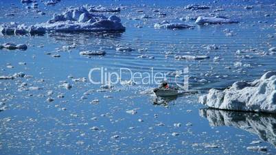 Small Craft Between Ice Floes