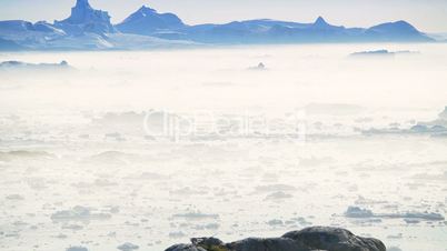 Nautical Vessel Moving in Ice Floes