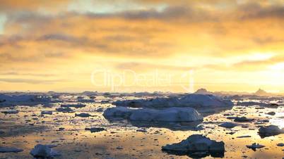 Melting Ice Floes at Sunset