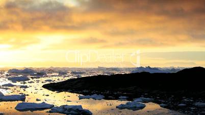 Pan Sunset of Melting Ice Floes