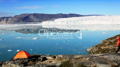 Female Hiker With Tent by Arctic Sea