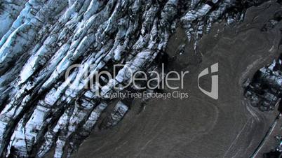 Aerial view of sedimentary layers of Volcanic dust on a glacier, Iceland