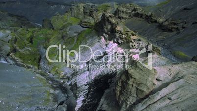 Aerial view of rugged cliffs and canyons disturbed by recent eruptions, Arctic region