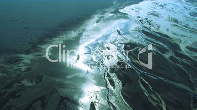 Aerial View of Glacial Meltwater in River Deltas, Arctic Region