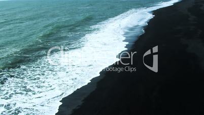Aerial View Over Black Volcanic Ash Beach, Iceland