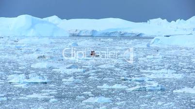 Nautical Vessel Between Ice Floes