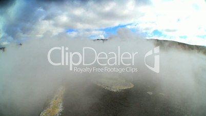 Wind Blowing Volcanic Steam from Underground Springs