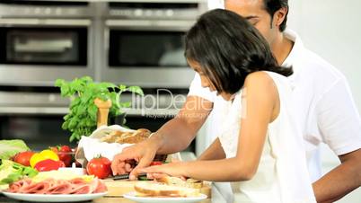 Young Asian Girl & Father Making Lunch