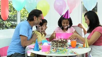 Young Asian Birthday Girl Receiving a Gift