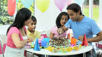 Young Asian Children Enjoying Birthday Cake