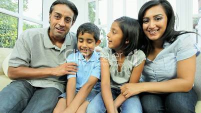 Young Ethnic Family Using Online Video Chat