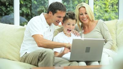 Caucasian Family   Communicating Via Online Webchat