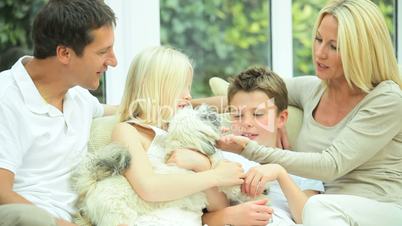 Young Caucasian Family with Pet Dog