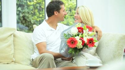 Pretty Blonde Female with Anniversary Bouquet