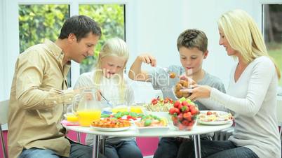 Young Family Enjoying a Healthy Meal