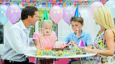Young Caucasian Birthday Boy at Family Party