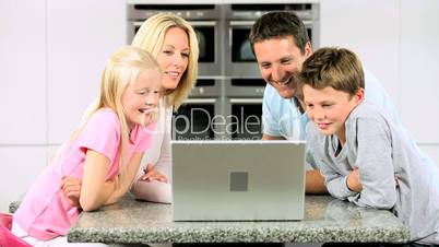 Young Caucasian Family Using Online Video Chat