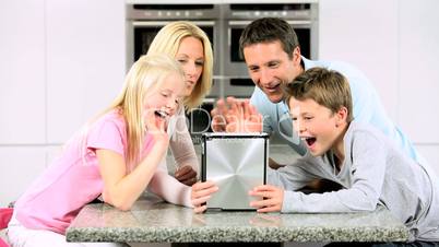 Caucasian Family Using Online Video Chat with Relatives