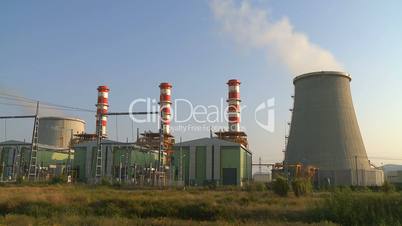 Power plant smokestacks time lapse